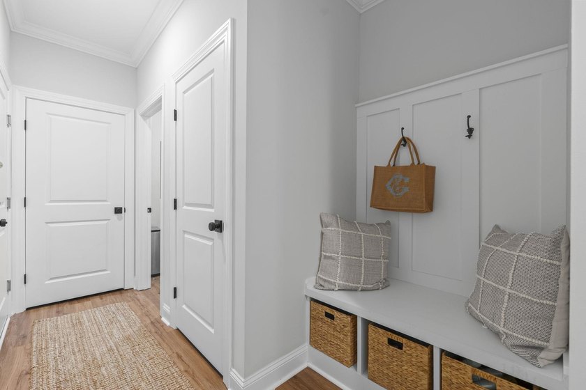Built in 2023, this like-new home combines modern design - photo 25