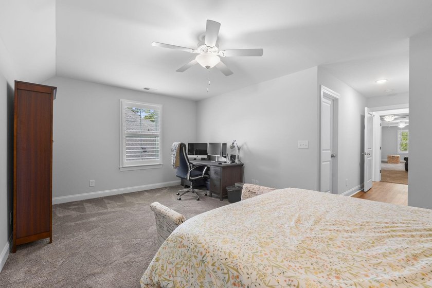 Built in 2023, this like-new home combines modern design - photo 30