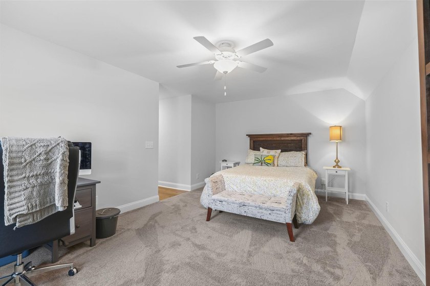 Built in 2023, this like-new home combines modern design - photo 31