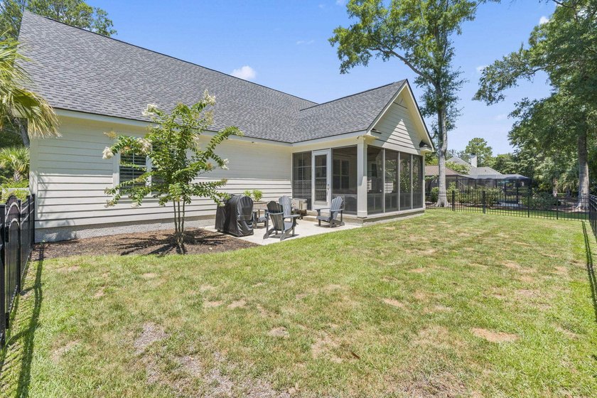 Built in 2023, this like-new home combines modern design - photo 35