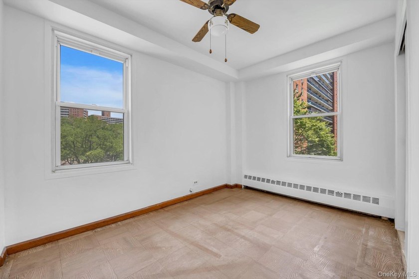 Welcome to this spacious and inviting 2-bedroom, 1-bath co-op - photo 8