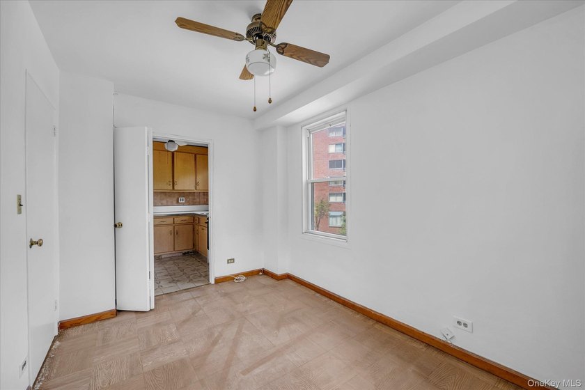Welcome to this spacious and inviting 2-bedroom, 1-bath co-op - photo 10