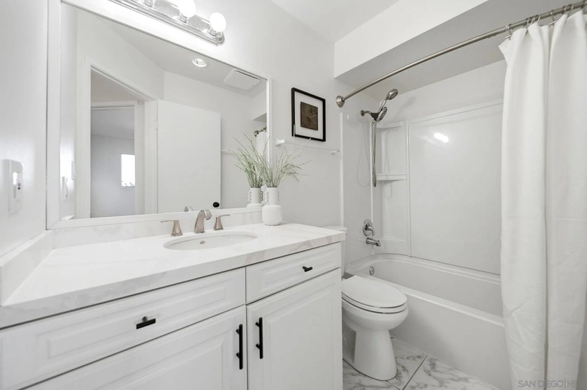 This corner-unit features views of Mount Soledad from several - photo 14