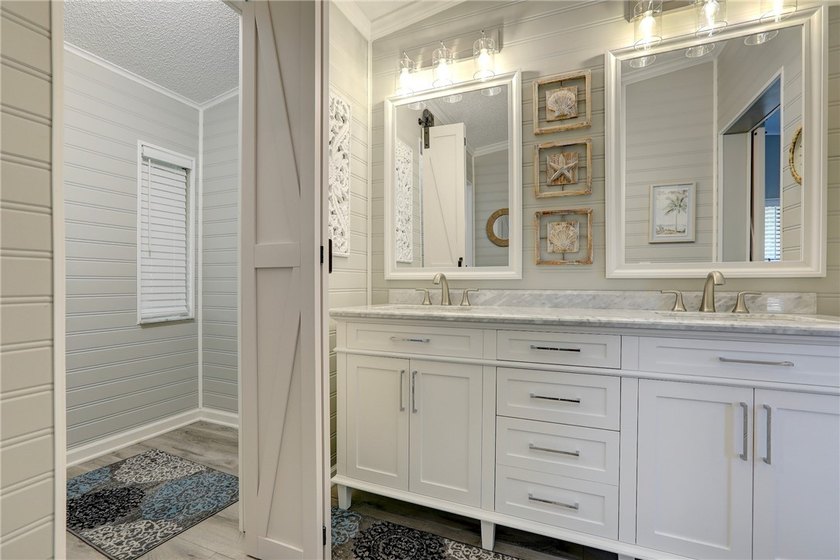 Situated on a sought-after 75' x 100' Haven Green lot, this - photo 15