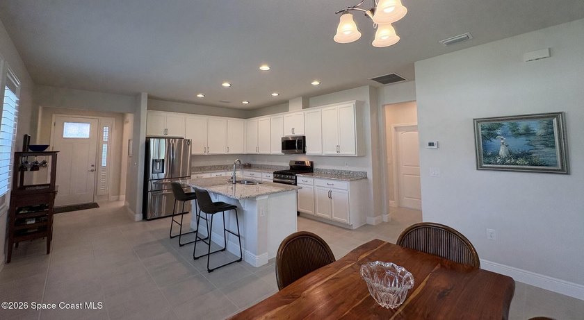 Beautifully maintained 2024 waterfront home in desirable Pangea - photo 7