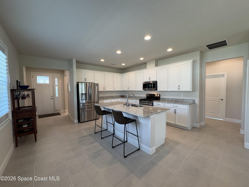 Beautifully maintained 2024 waterfront home in desirable Pangea - photo 8