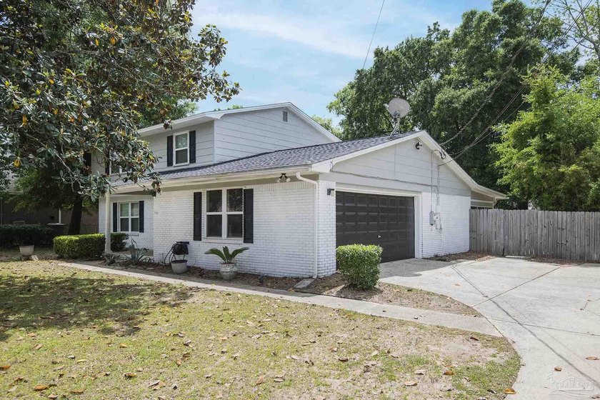 Welcome to this conveniently located 3 bedroom, 2.5 bath home - photo 2