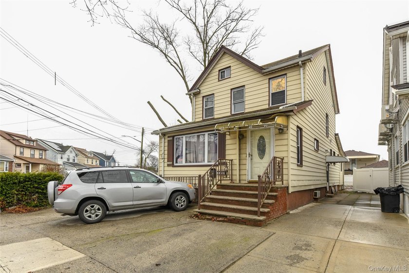 Well maintained two family in residential Rosedale. Both floors - photo 3