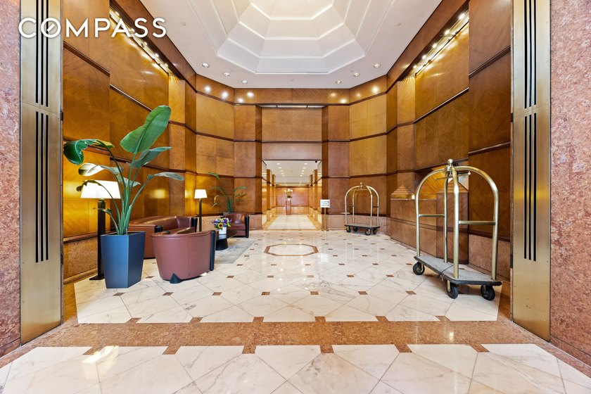 Perched on the 43rd floor of the iconic CitySpire tower, this - photo 2