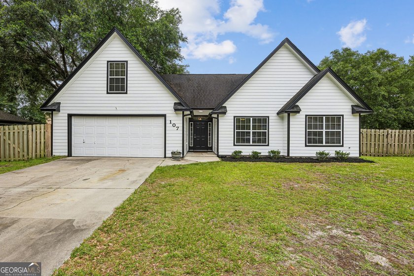 Offering 1,872 square feet of versatile living space, this - photo 2