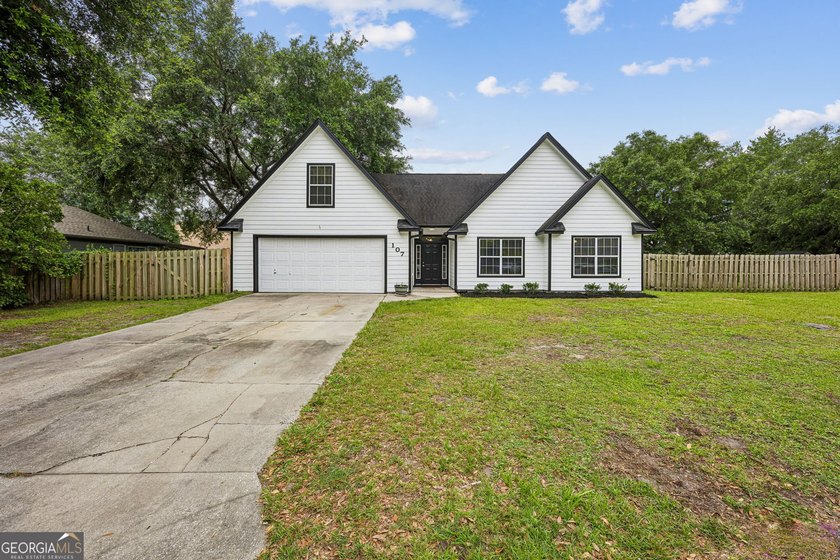 Offering 1,872 square feet of versatile living space, this - photo 3