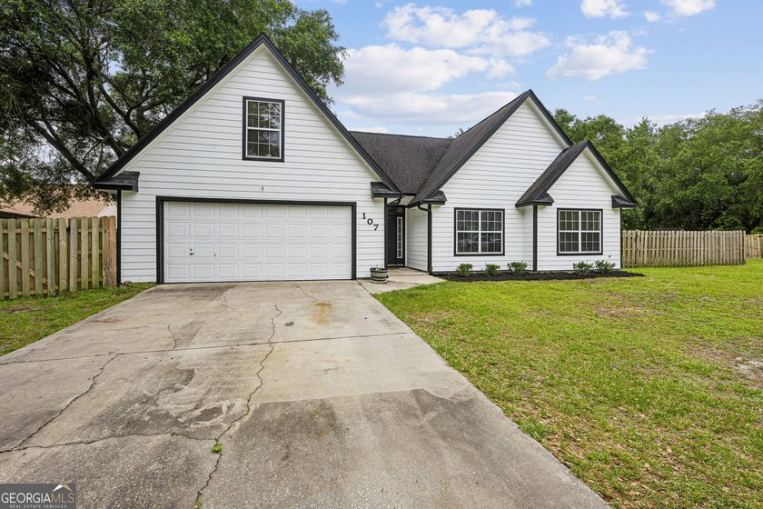 Offering 1,872 square feet of versatile living space, this - photo 4