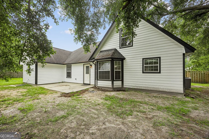 Offering 1,872 square feet of versatile living space, this - photo 7