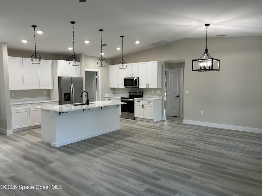 Luxury meets functionality in this exceptional new construction - photo 3