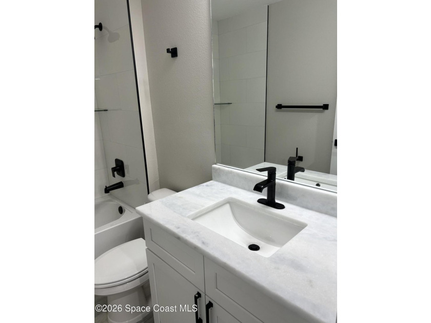 Luxury meets functionality in this exceptional new construction - photo 10