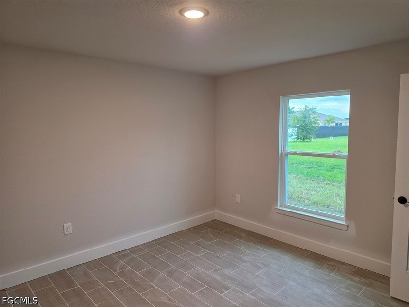 New Construction | NW Cape Coral Experience the perfect blend of - photo 15