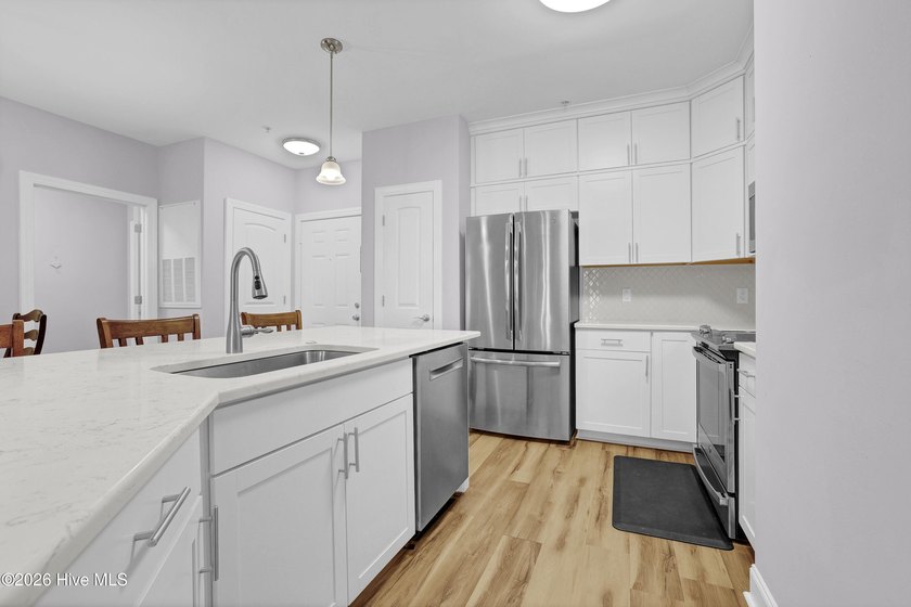 Coastal convenience meets low-maintenance living in this - photo 4