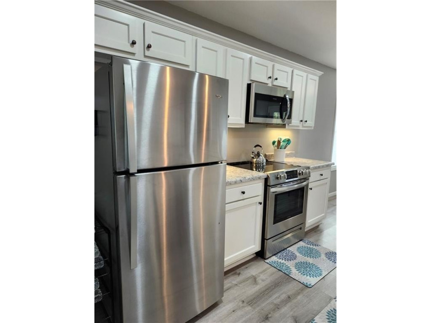 This almost-new home comes fully furnished and ready to make - photo 11