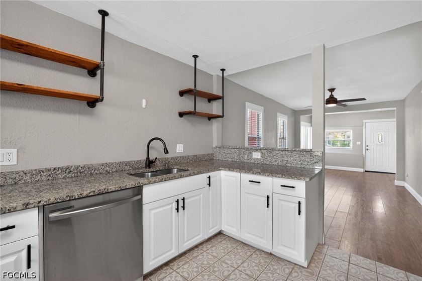 This adorable home is as lovely inside as it is from the street - photo 18