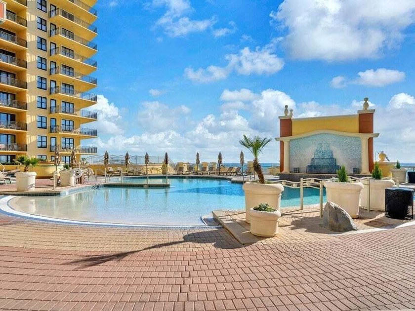 GREAT PRICE REDUCTION. Prime unit opens directly to pool deck. 2 - photo 2