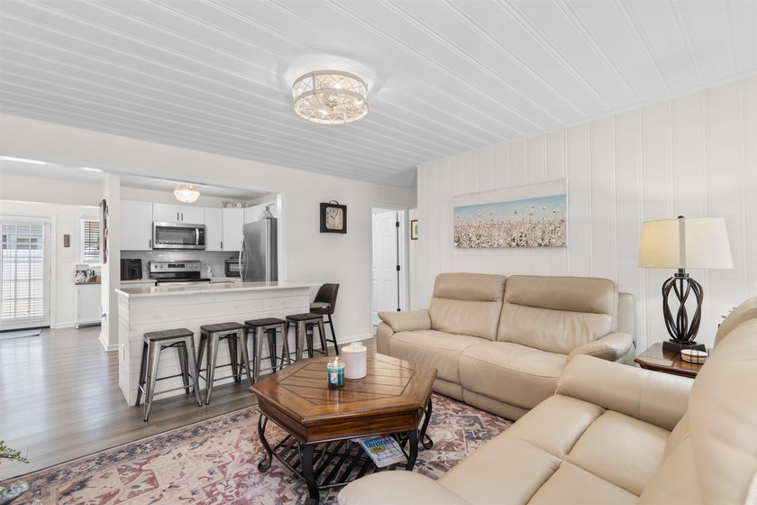 Your quintessential coastal retreat awaits. This immaculate - photo 14