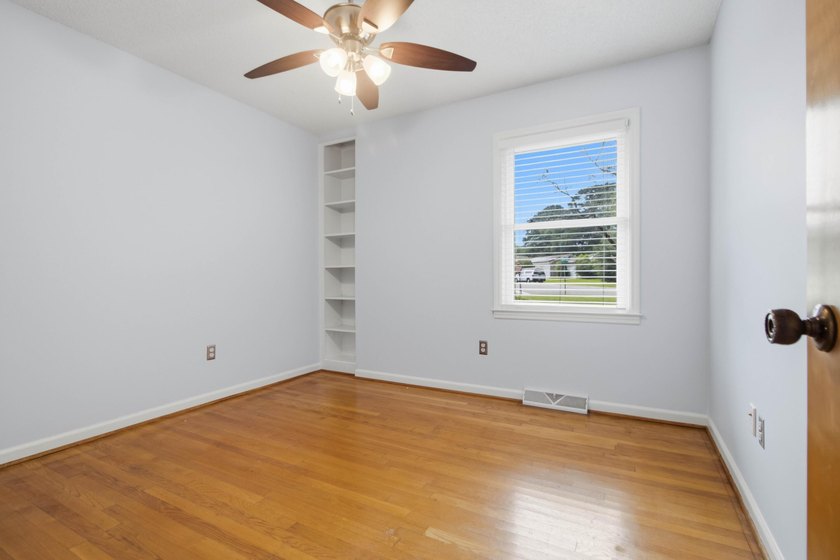 Situated on a spacious corner lot surrounded by mature trees - photo 15