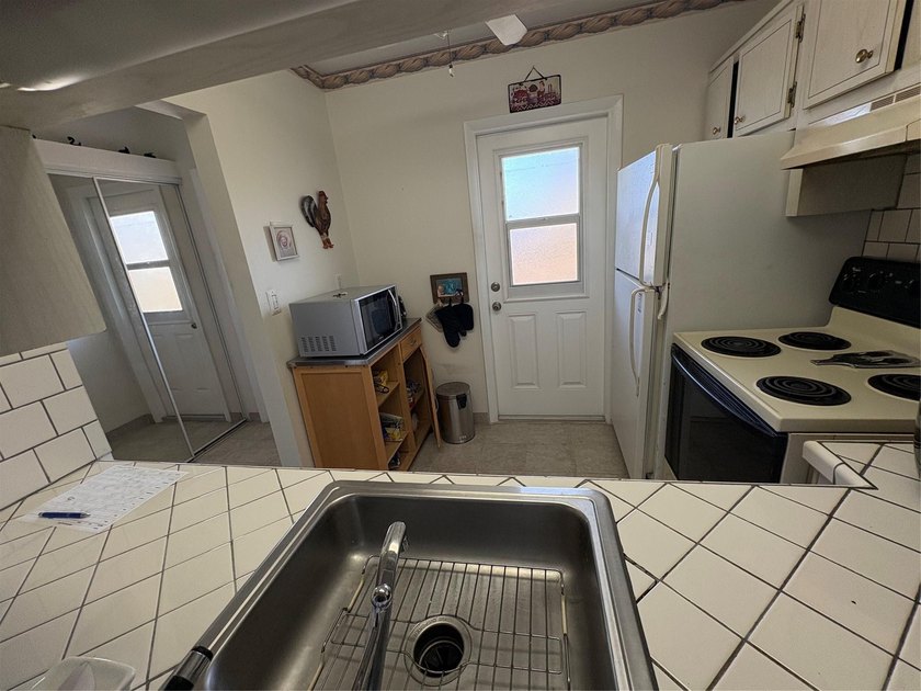 Motivated seller, reduced price!. Enjoy beautiful water view - photo 29