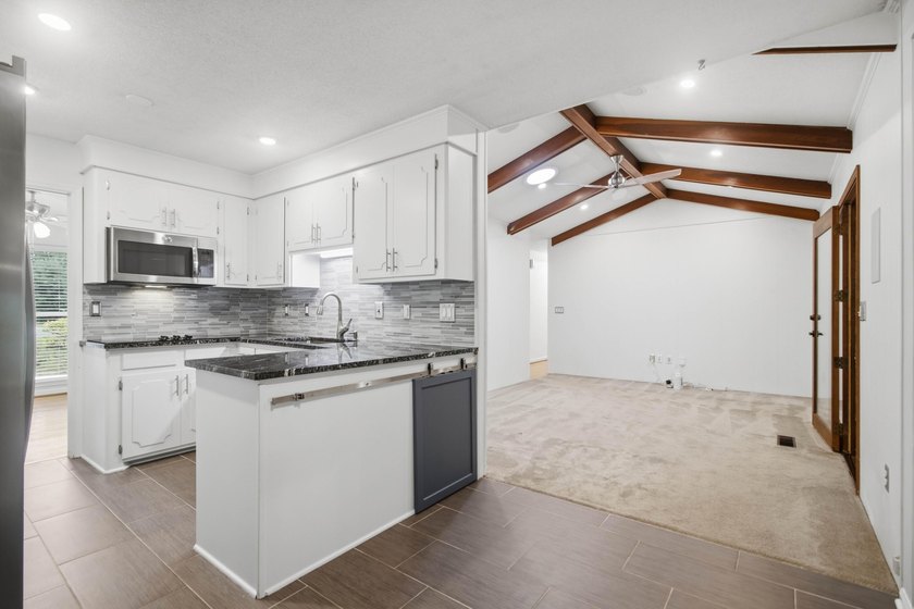Situated on a spacious corner lot surrounded by mature trees - photo 30