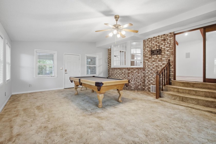 Situated on a spacious corner lot surrounded by mature trees - photo 40