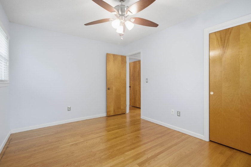 Situated on a spacious corner lot surrounded by mature trees - photo 45