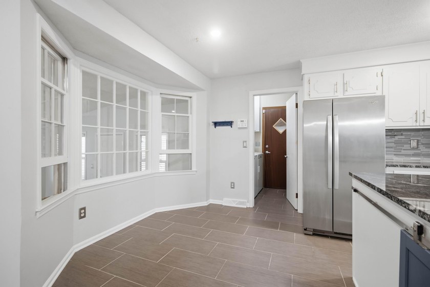 Situated on a spacious corner lot surrounded by mature trees - photo 50