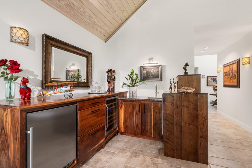 A serene 12 acres of lush pastureland and mature trees, this - photo 10
