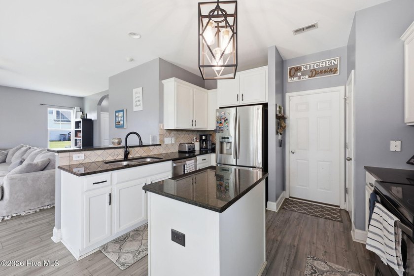 Welcome to this beautifully updated four-bedroom home in the - photo 14