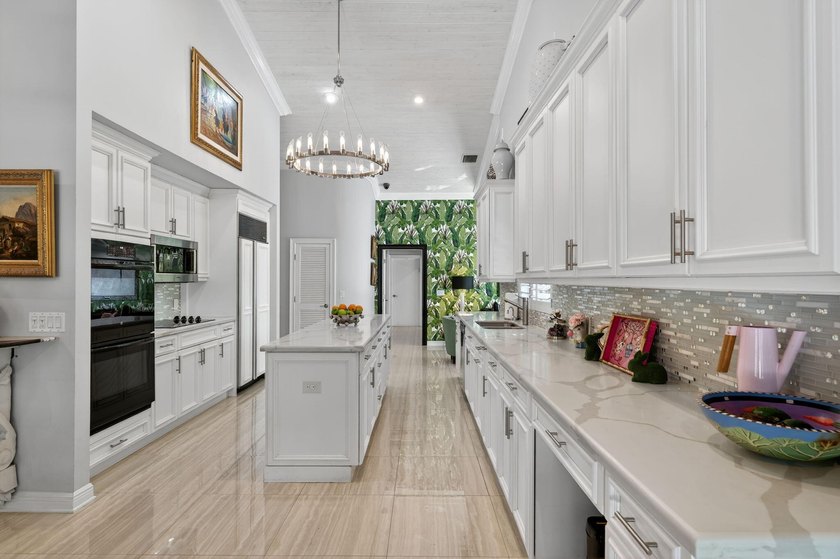 Welcome to this beautiful 4-bedroom, 4-bath residence in Boca - photo 16