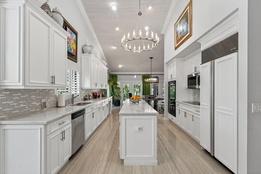 Welcome to this beautiful 4-bedroom, 4-bath residence in Boca - photo 18