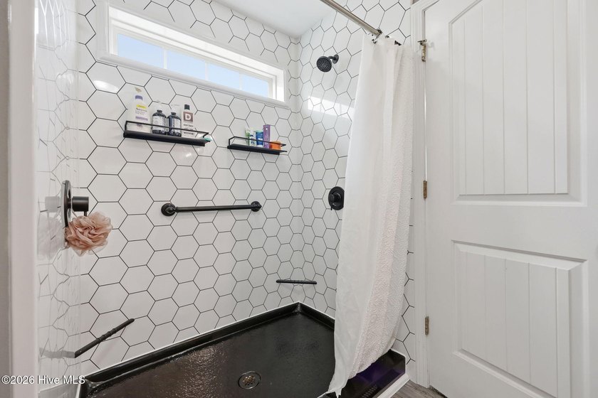 Welcome to this beautifully updated four-bedroom home in the - photo 23