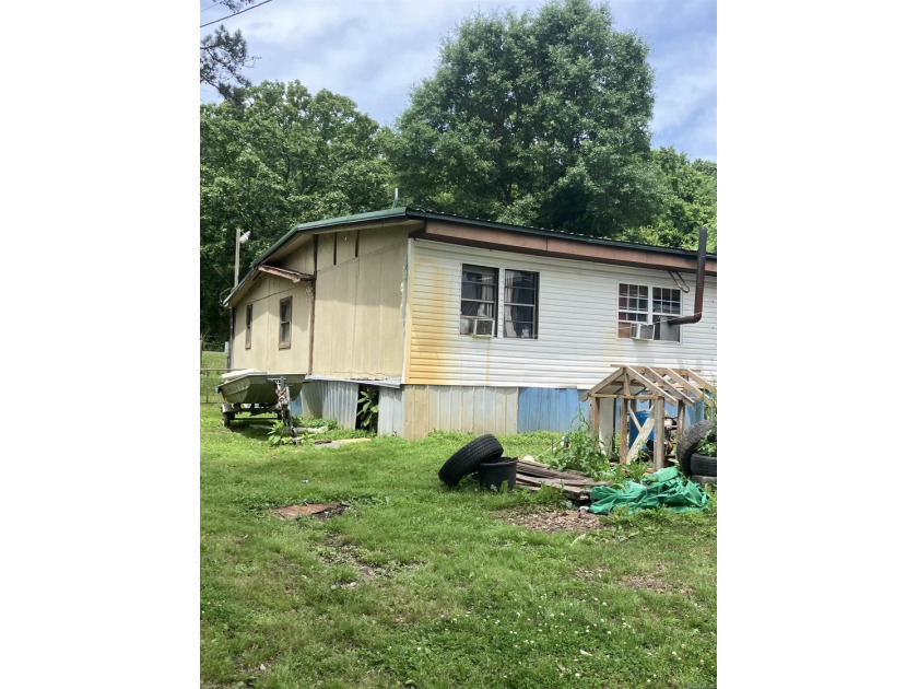 Tucked away on approximately 1 acre, this versatile manufactured - photo 11