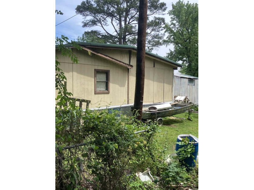 Tucked away on approximately 1 acre, this versatile manufactured - photo 15