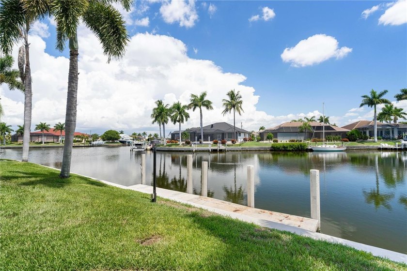 PGI WATERFRONT HOME W/STUNNING CANAL VIEW, 103 FT OF SEAWALL - photo 12