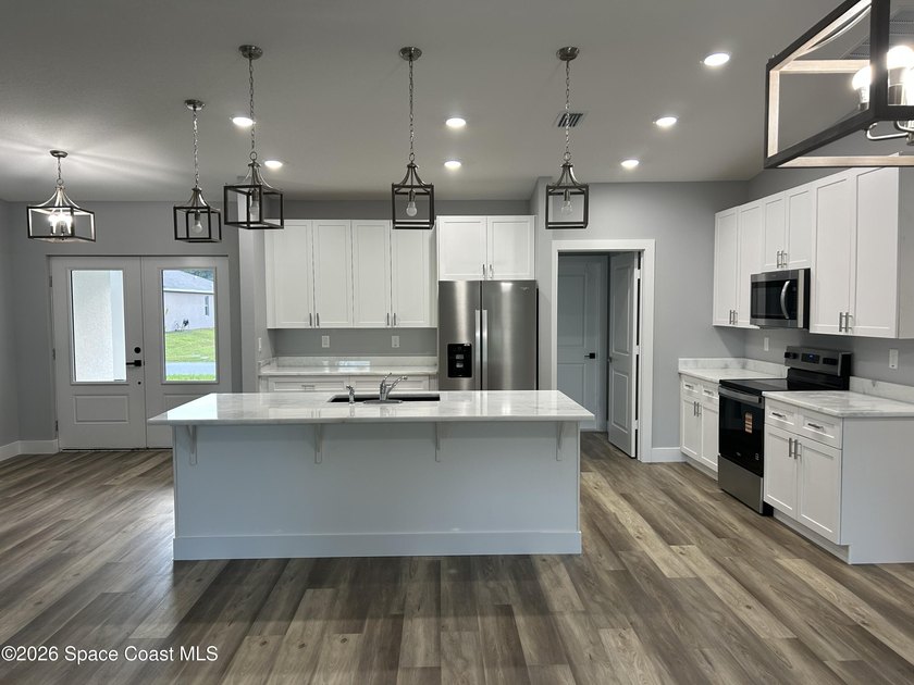 Experience modern living in this stunning new construction home - photo 4