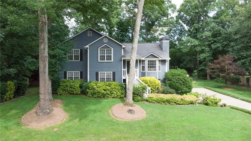 Welcome to #6580 Remington Drive in Cumming, a beautifully - photo 34