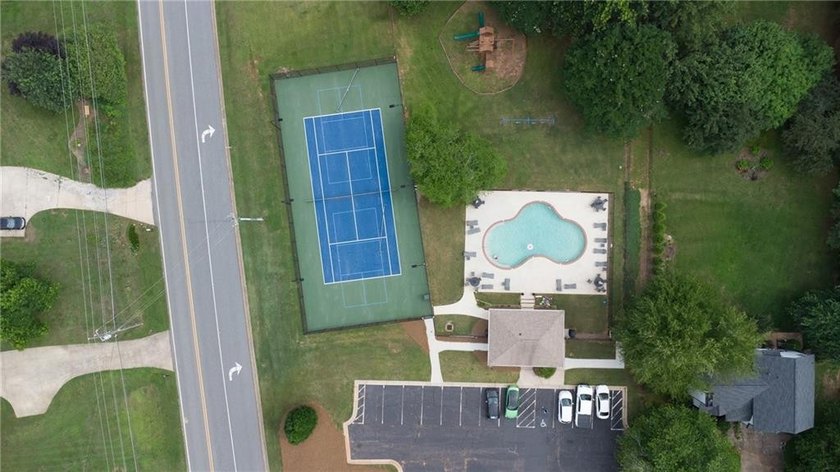 Welcome to #6580 Remington Drive in Cumming, a beautifully - photo 37