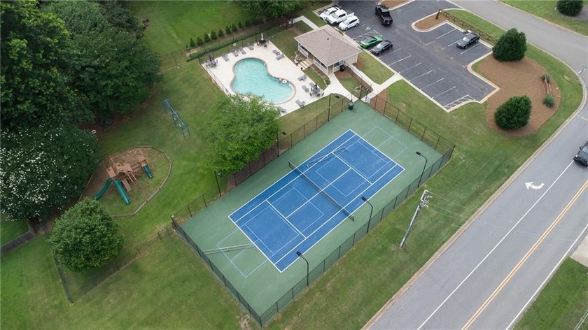 Welcome to #6580 Remington Drive in Cumming, a beautifully - photo 39