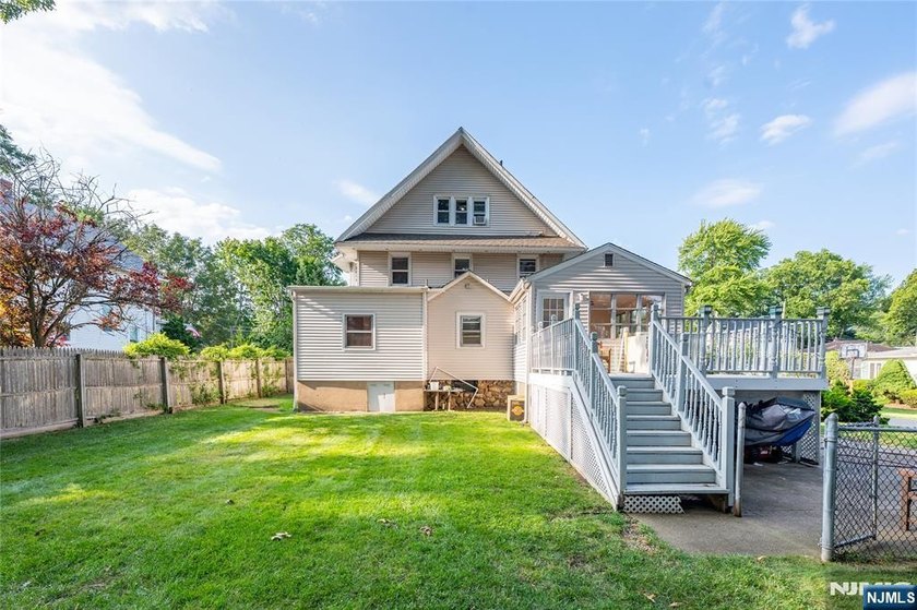 This income-producing two-family home lies in the heart of - photo 29