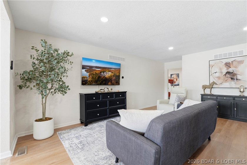 Lakefront living on 2 private acres at the 8MM near Laurie! - photo 11