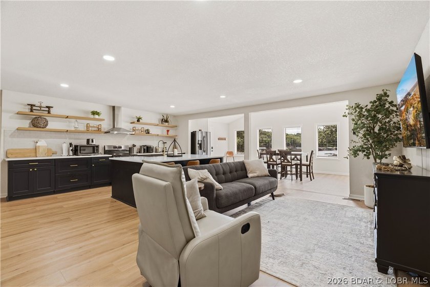 Lakefront living on 2 private acres at the 8MM near Laurie! - photo 13