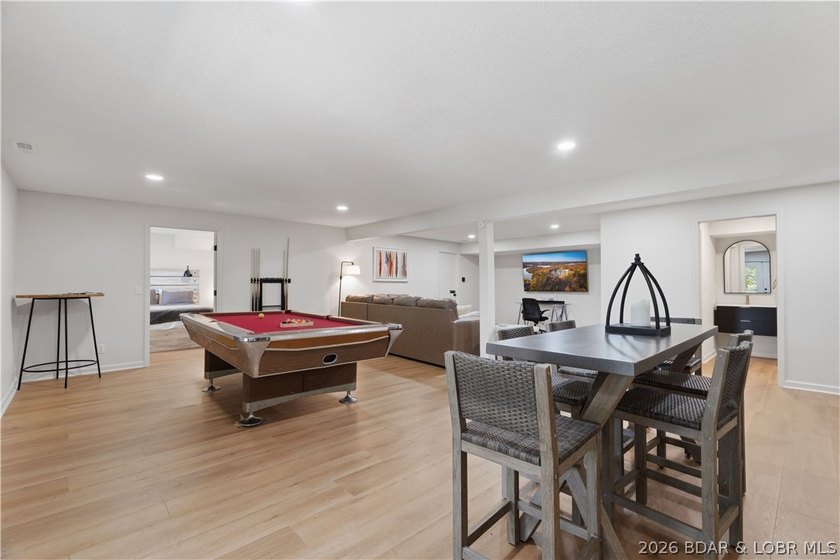 Lakefront living on 2 private acres at the 8MM near Laurie! - photo 21