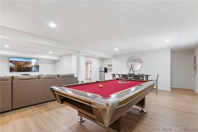 Lakefront living on 2 private acres at the 8MM near Laurie! - photo 23
