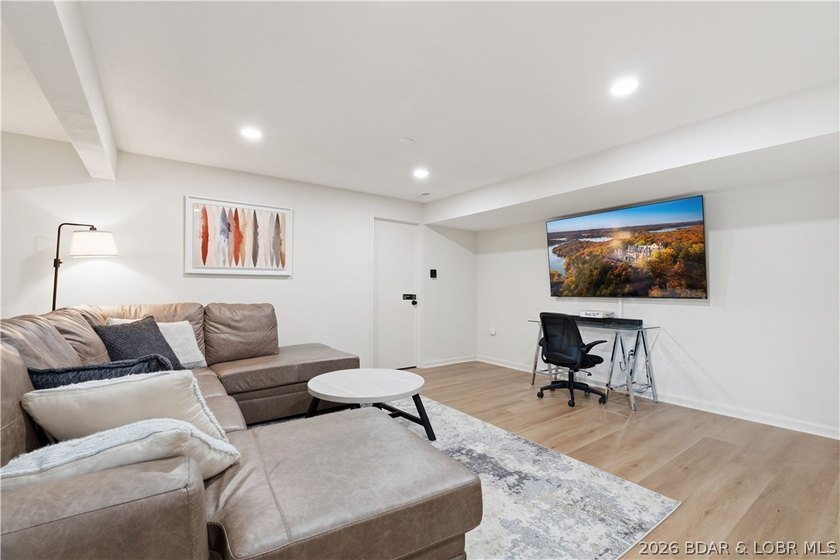 Lakefront living on 2 private acres at the 8MM near Laurie! - photo 26