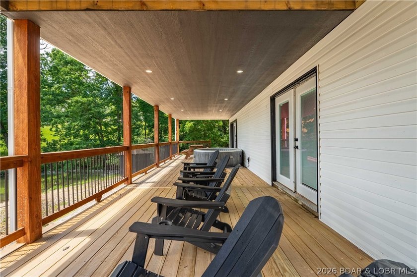 Lakefront living on 2 private acres at the 8MM near Laurie! - photo 34